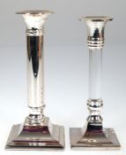 2 Kerzenhalter, 1-flammig, versilbert, 1x Schaft mit farblosem Kunststoffeinsatz, H. 18,5 cm und 19