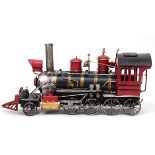 Fahrzeugmodell "Dampflokomotive", Metall, farbig und goldfarben gefasst, Gebrauchspuren, L. 40 cm, 