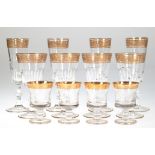 Konvolut von 12 diversen Gläsern mit Goldrand, dabei 4 Sektgläser und 4 Weingläser, farbloses Glas 