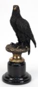 Bronze-Figur "Adler", Nachguß, z.T. schwarz patiniert,  bez. "A. Thorburn", auf rundem, schwarzem M