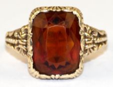 Ring mit Goldtopas, 585er GG, in Zargenfassung, phantasievolle Gestaltung, ges. 6,4 g, RG 59