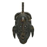 Kleine Maske. Senufo, Elfenbeinküste (wohl) | Holz, geschnitzt, dunkel patiniert.