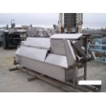 (Located in Morgan Hill, CA) Gravity Filler Over Flow, All S/S set on 603 x 700 Can, Has Timing Scre