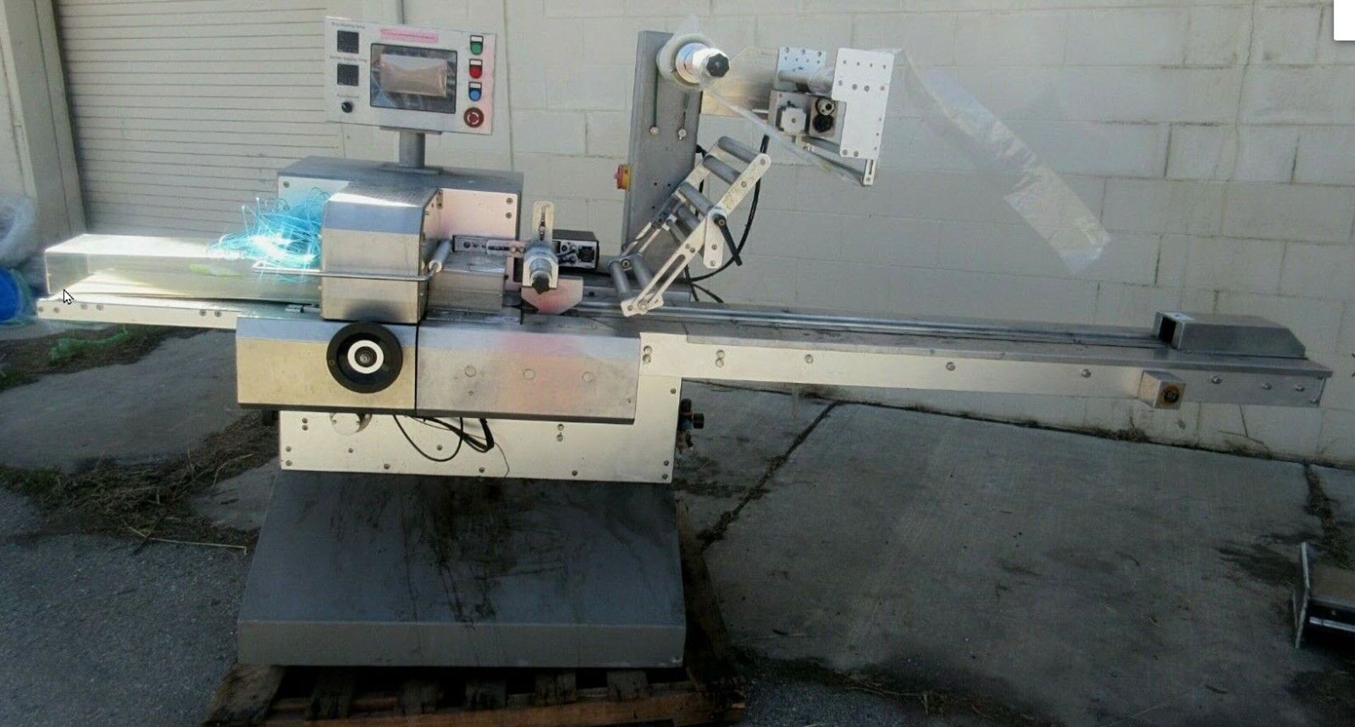 (Located in Hollister, CA) Alphapack AHP-40 Horizontal Flow Wrapper, Rigging Fee: $100