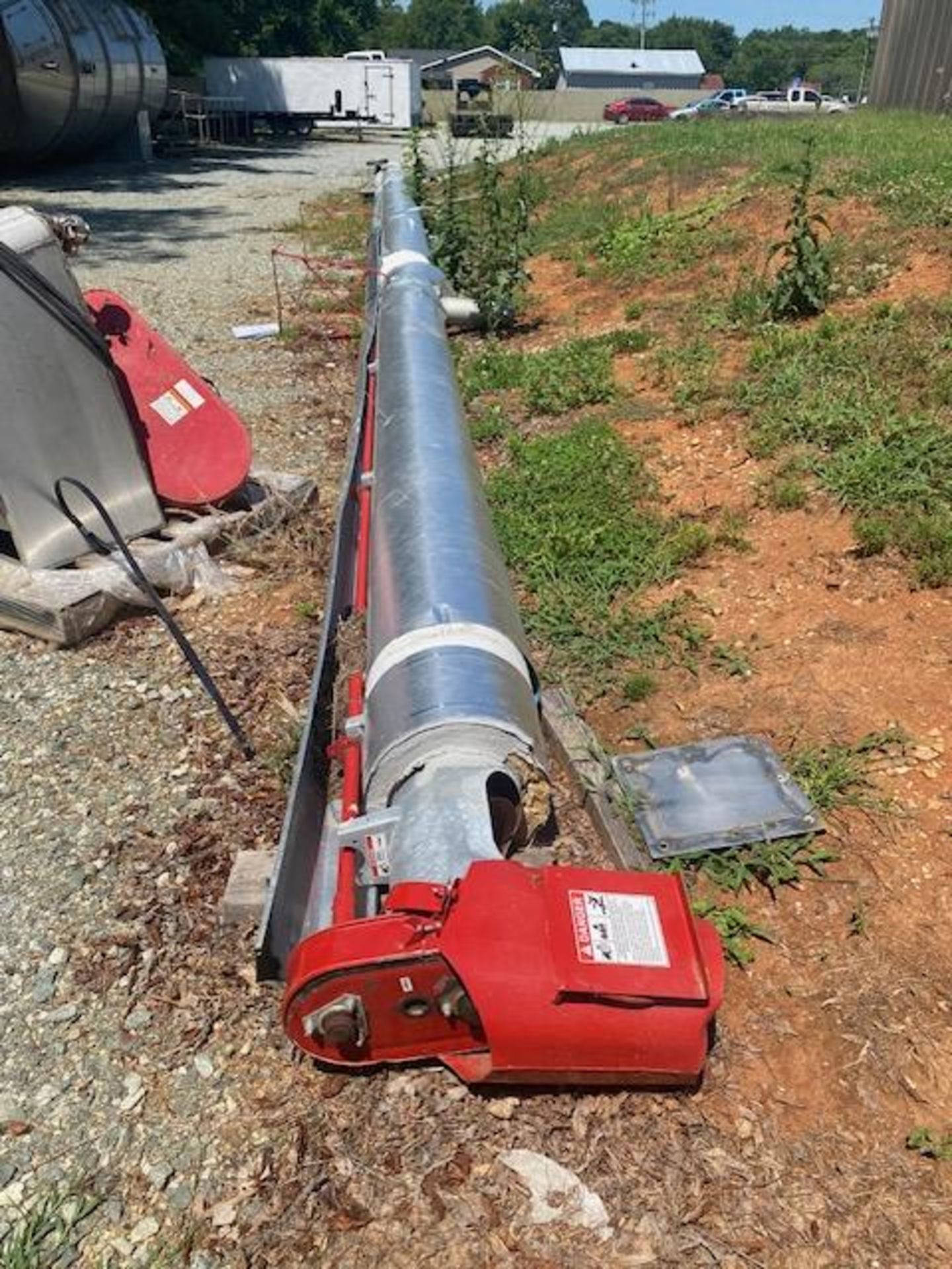 Lot Location: Greensboro NC 9'' DIAMETER X 53'' LONG, 20 HP TUBULAR INCLINED SCREW CONVEYOR AUGER.