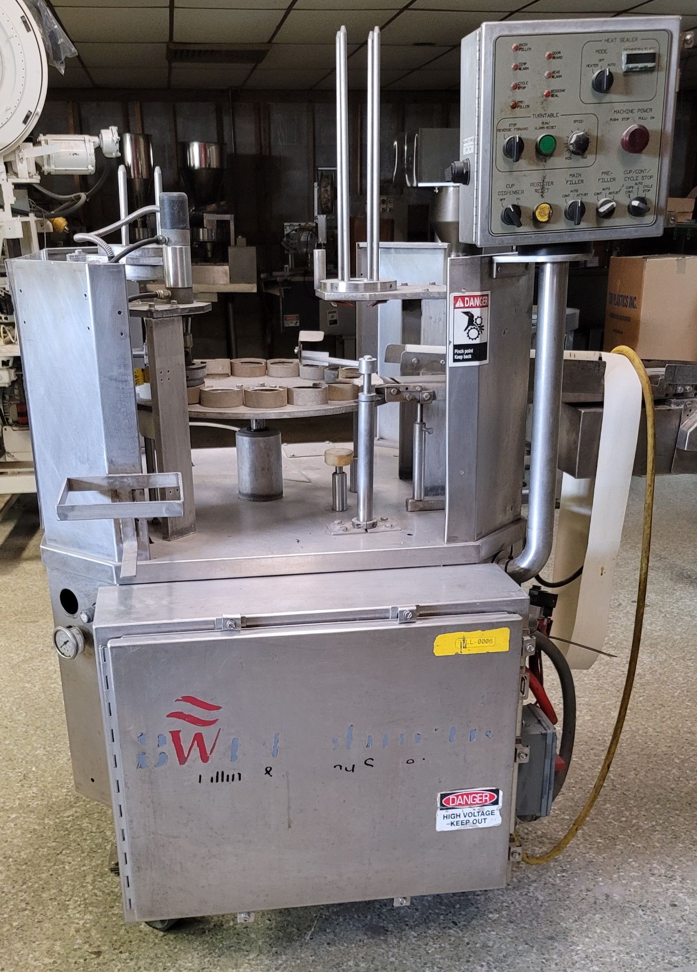 (Located in Belle Glade, FL) BWI HOLMATIC ROTARY CUP FILLER SEALER, Rigging/Loading Fee: $100 - Image 4 of 5