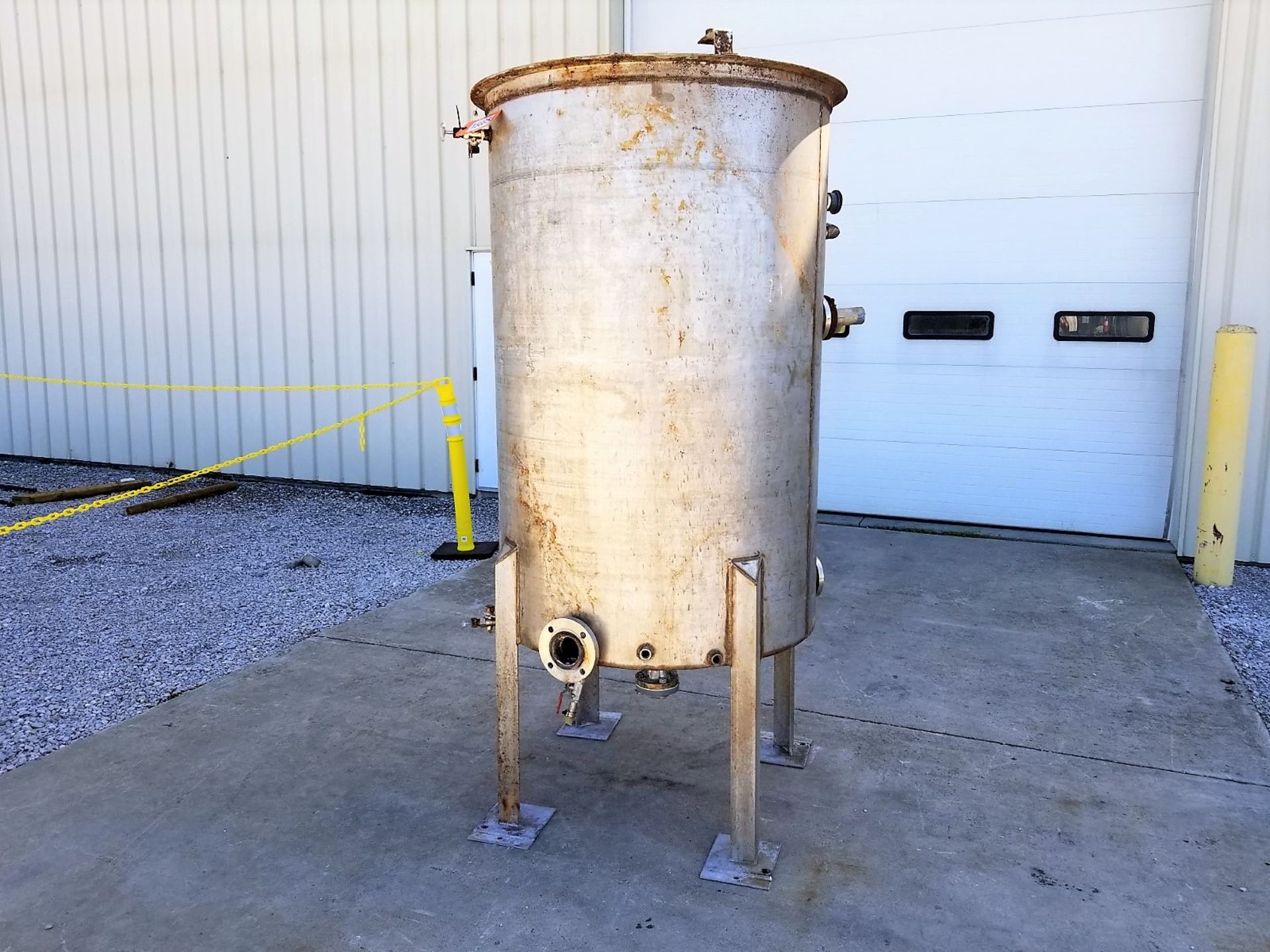 Lot Location: Greensboro NC 500 gallon Stainless Steel Tank with Pipe Coils