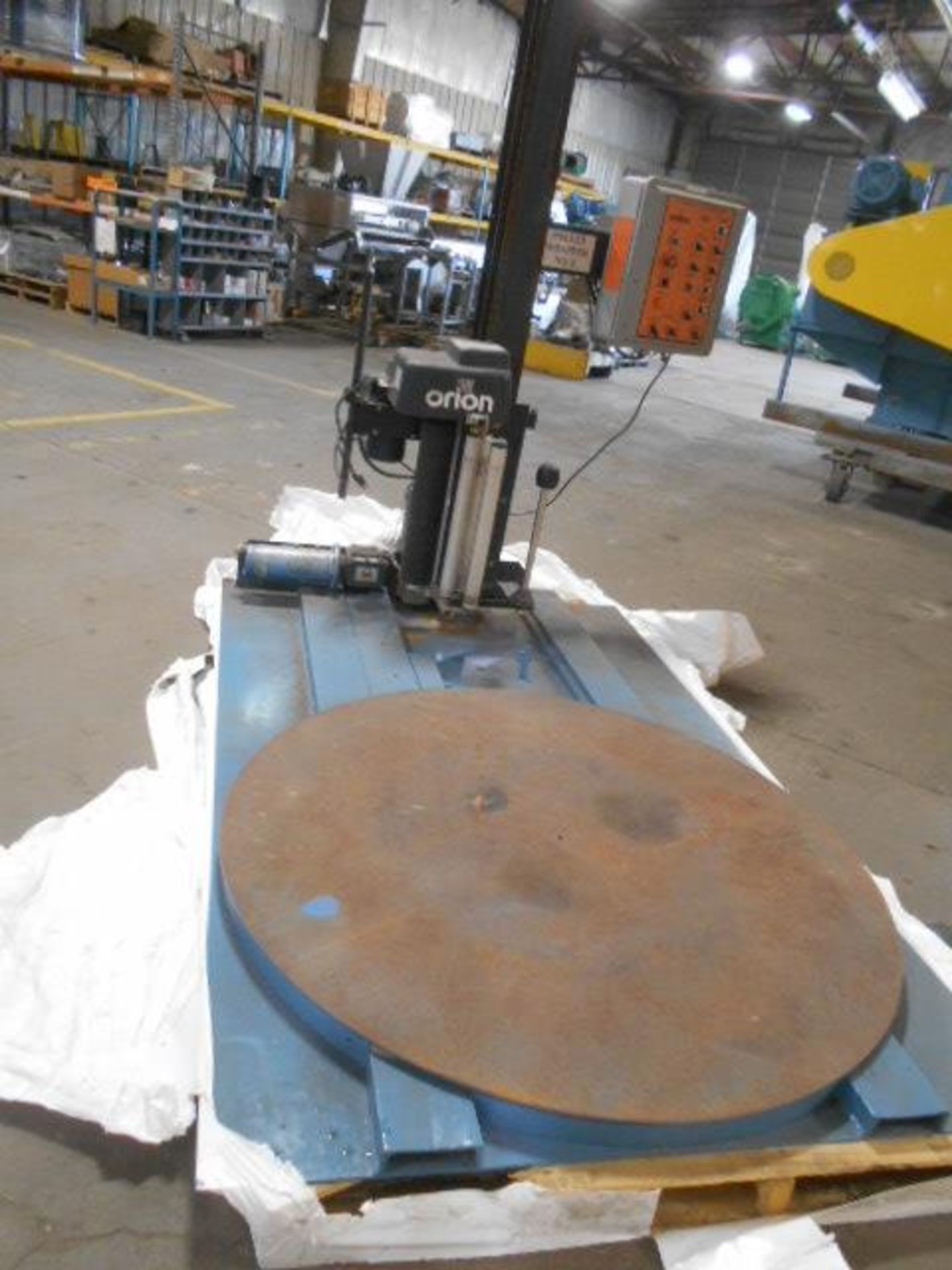 Lot Location: Newton KS - Orion pallet wrapper model # l66-12s-3m, 48” turntable serial # 8068237 - Image 2 of 7