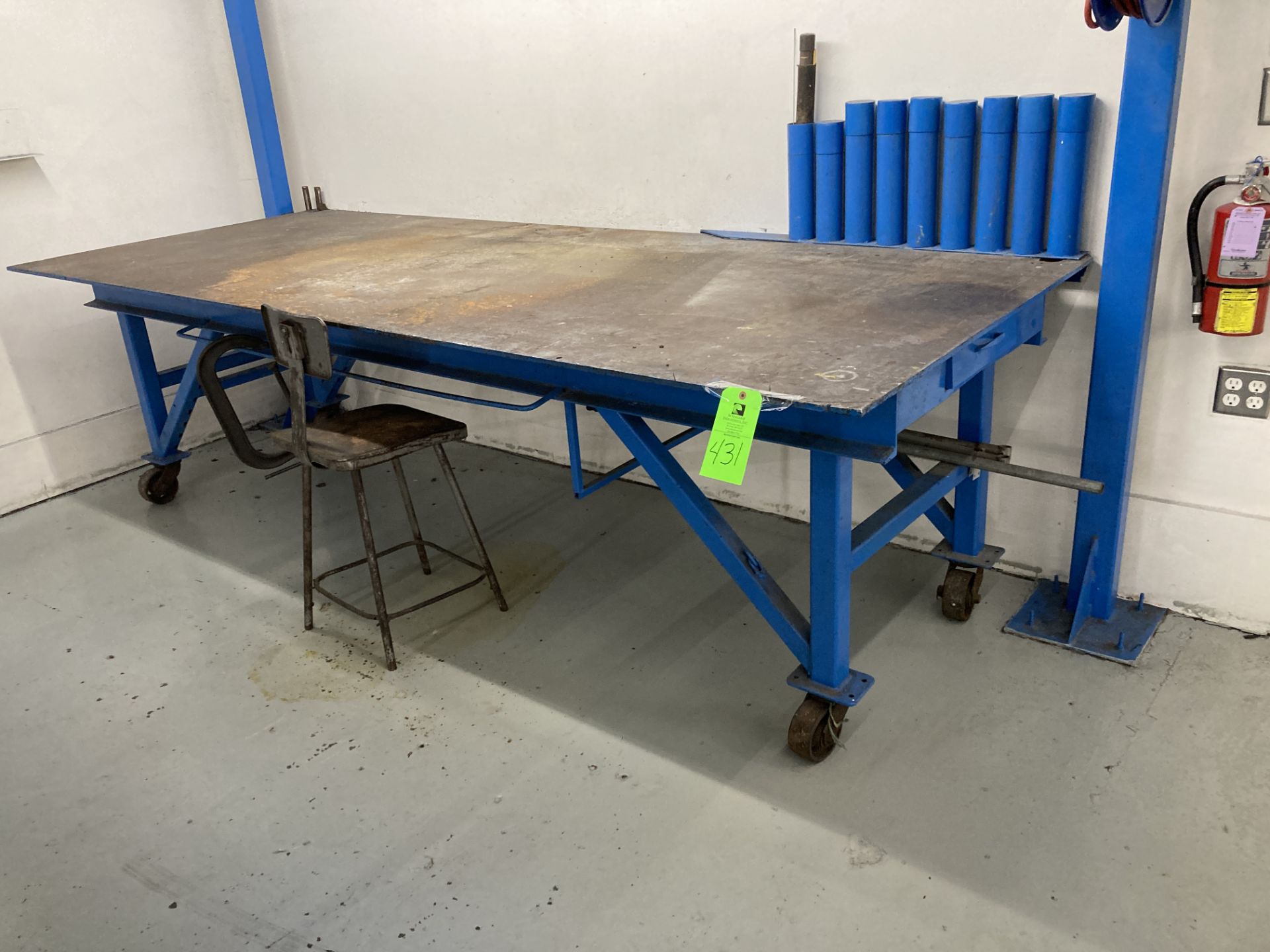 Steel workbench table with caster, 4 ft x 8 ft Rigging Fee: $100