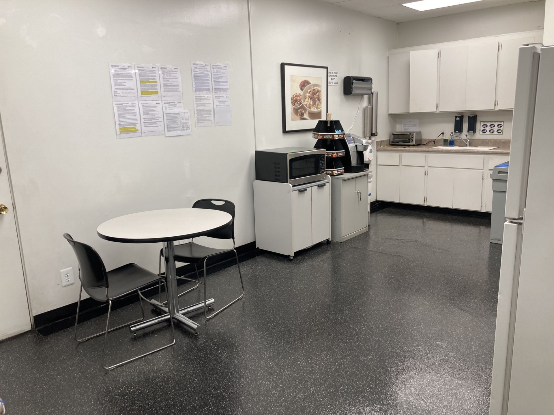 LOT OF break room, table 42 in dia, chairs, towel, cup, soap wall dispensers, microwave with cart,