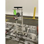 Hand operated lift truck with straddle legs Rigging Fee: $ 75