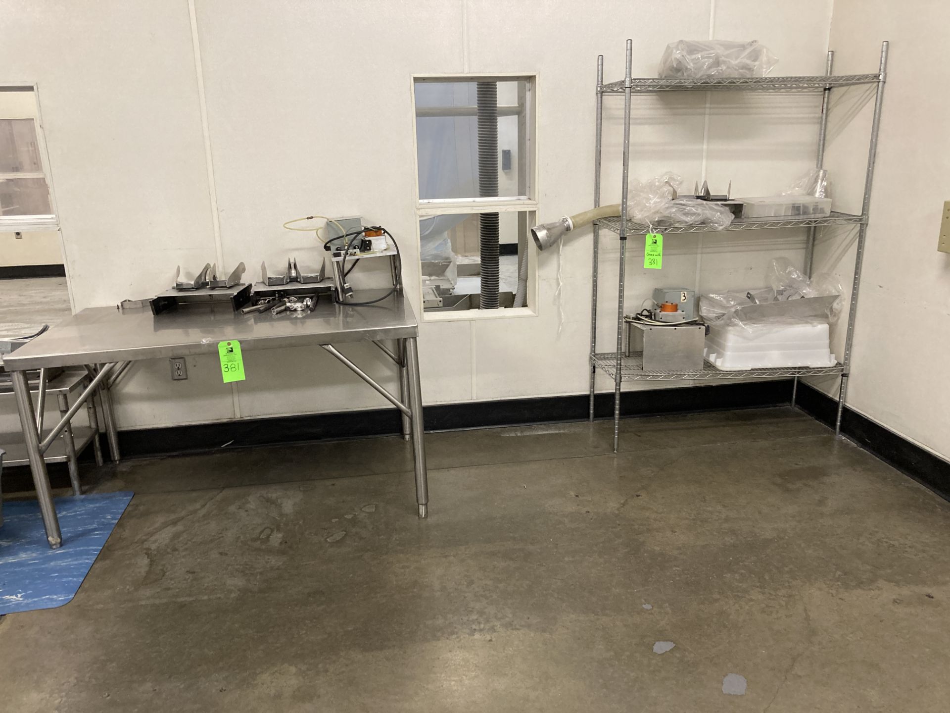 LOT OF stainless steel table 60 in x 36 in x 32 in h and shelf unit 48 in x 16 in 76 in Rigging Fee: