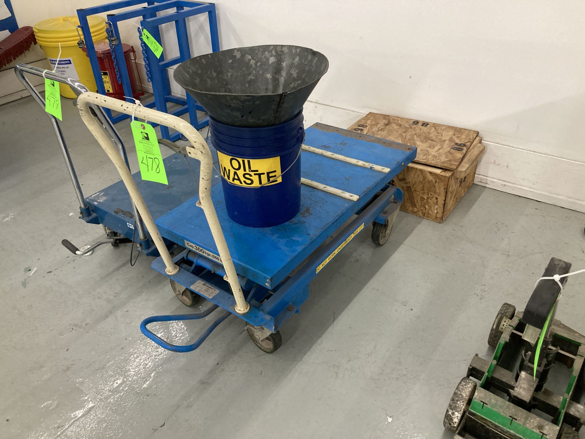 Bishamon lift table push cart with funnel, 40 in x 20 in platform , 660 lbs cap. Rigging Fee: $ 35