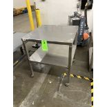 Stainless steel table with caster, 30 in x 30 in x 34 in h Rigging Fee: $ 35