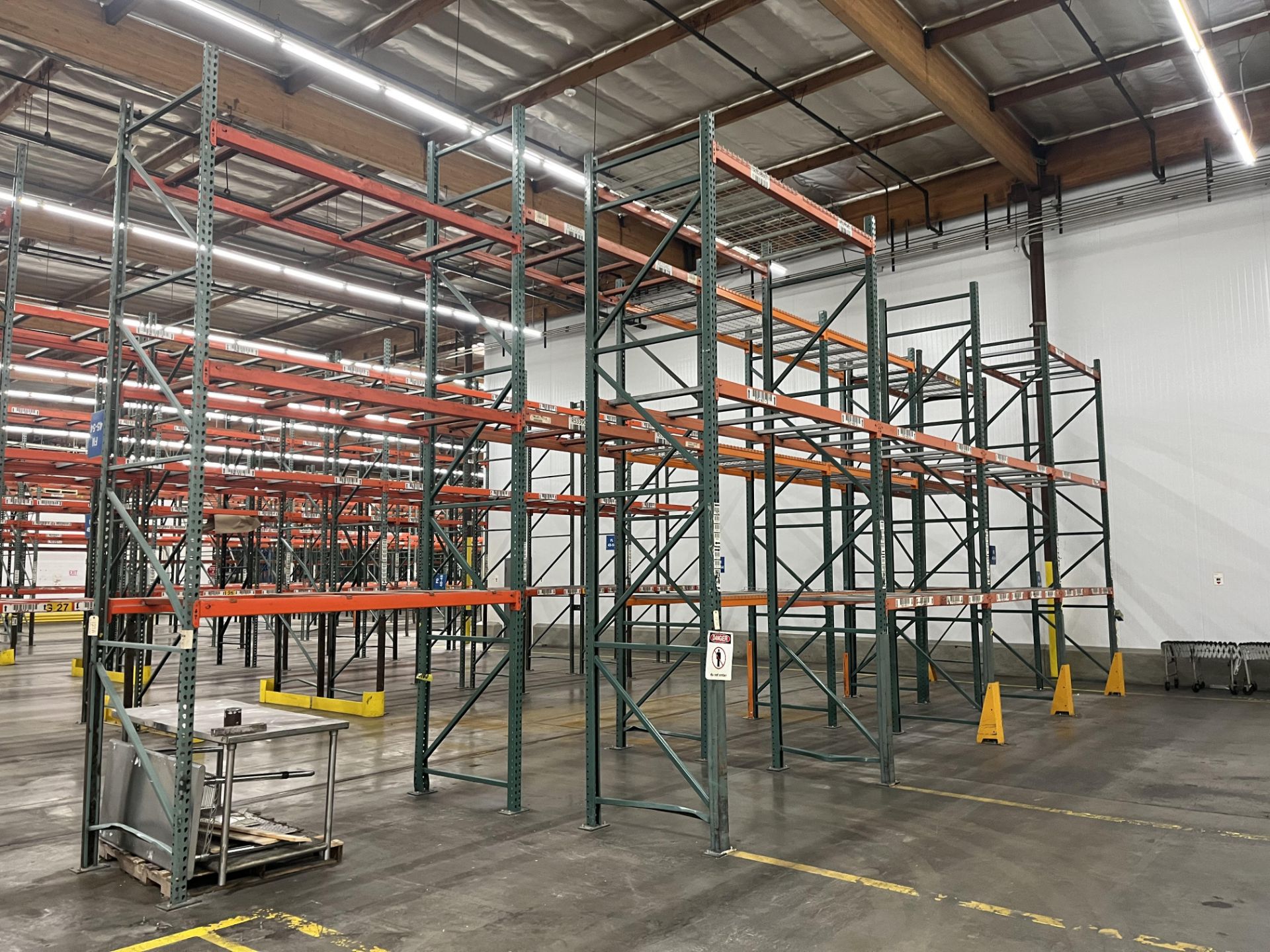 30 sections teardrop pallet racking, fits two pallets per section (Rigging Fee: 7500)