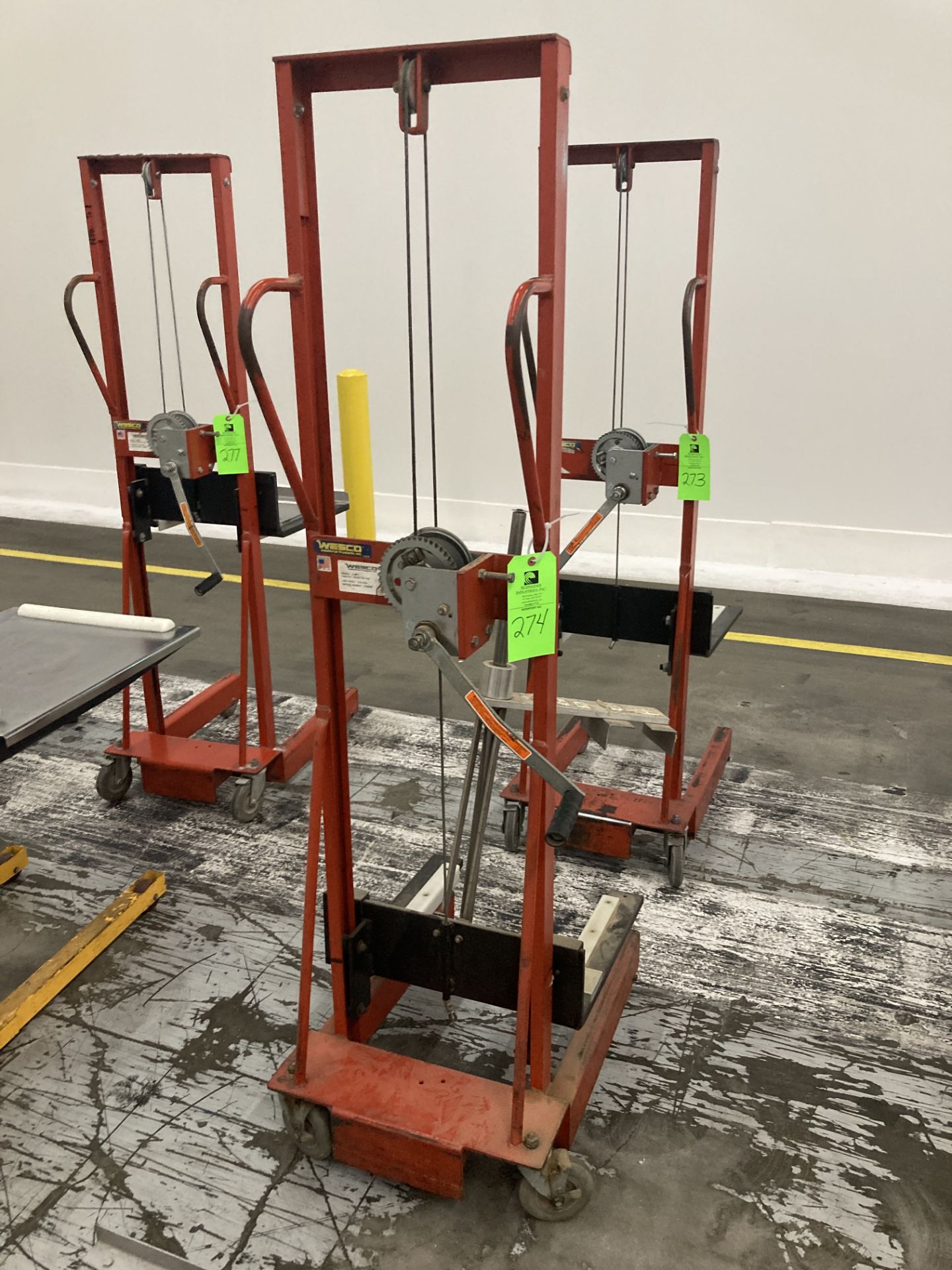 Wesco hand operated lift truck with straddle legs, approx. 500 lbs cap Rigging Fee: $ 50