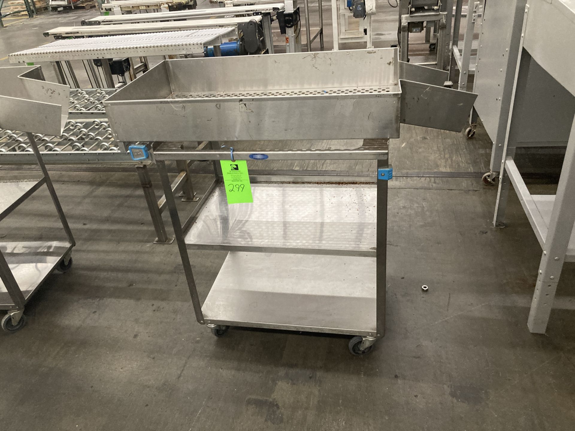 Qty. 2 Stainless steel push carts with strainer, 36 in x 18 in Rigging Fee: $ 40