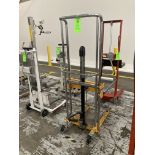 Manual hydraulic operated lift truck with straddle legs, approx. 880 lbs cap Rigging Fee: $ 50