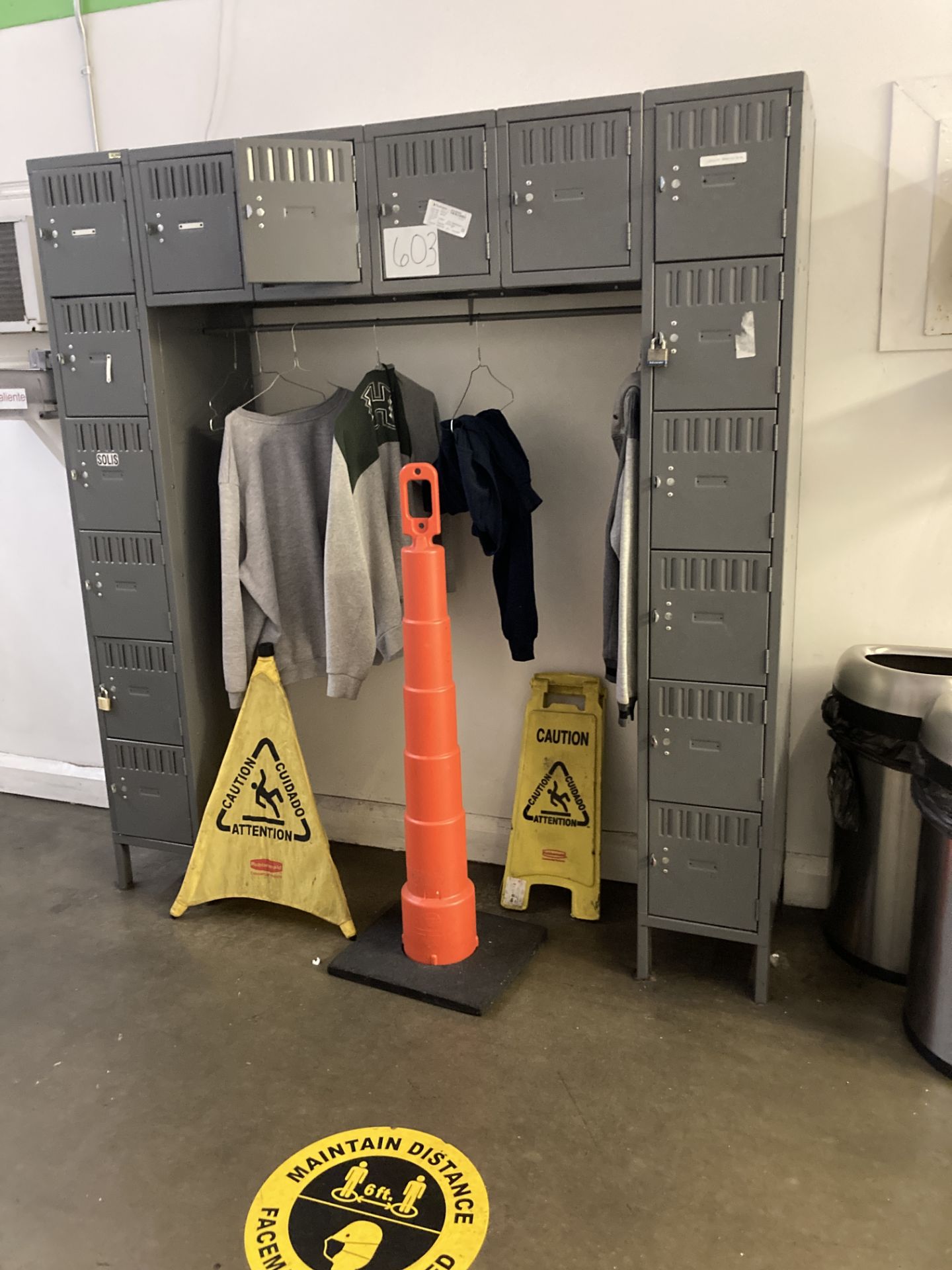 LOT OF metal locker 72 in x 18 in x 78 in h with orange cone and floor hazard signage Rigging Fee: $