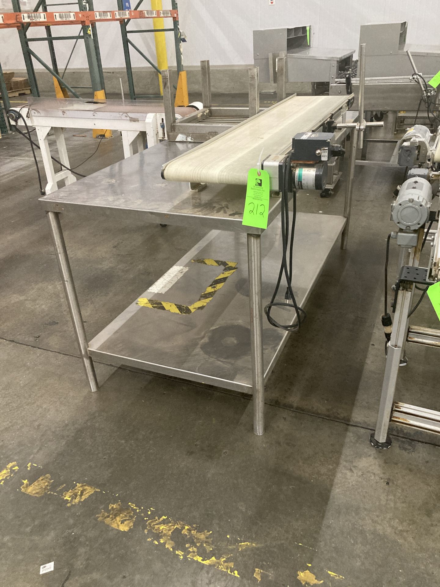 Stainless steel table 32 in x 72 in with VFD control Dorner conveyor 12 in x 60 in Rigging Fee: $