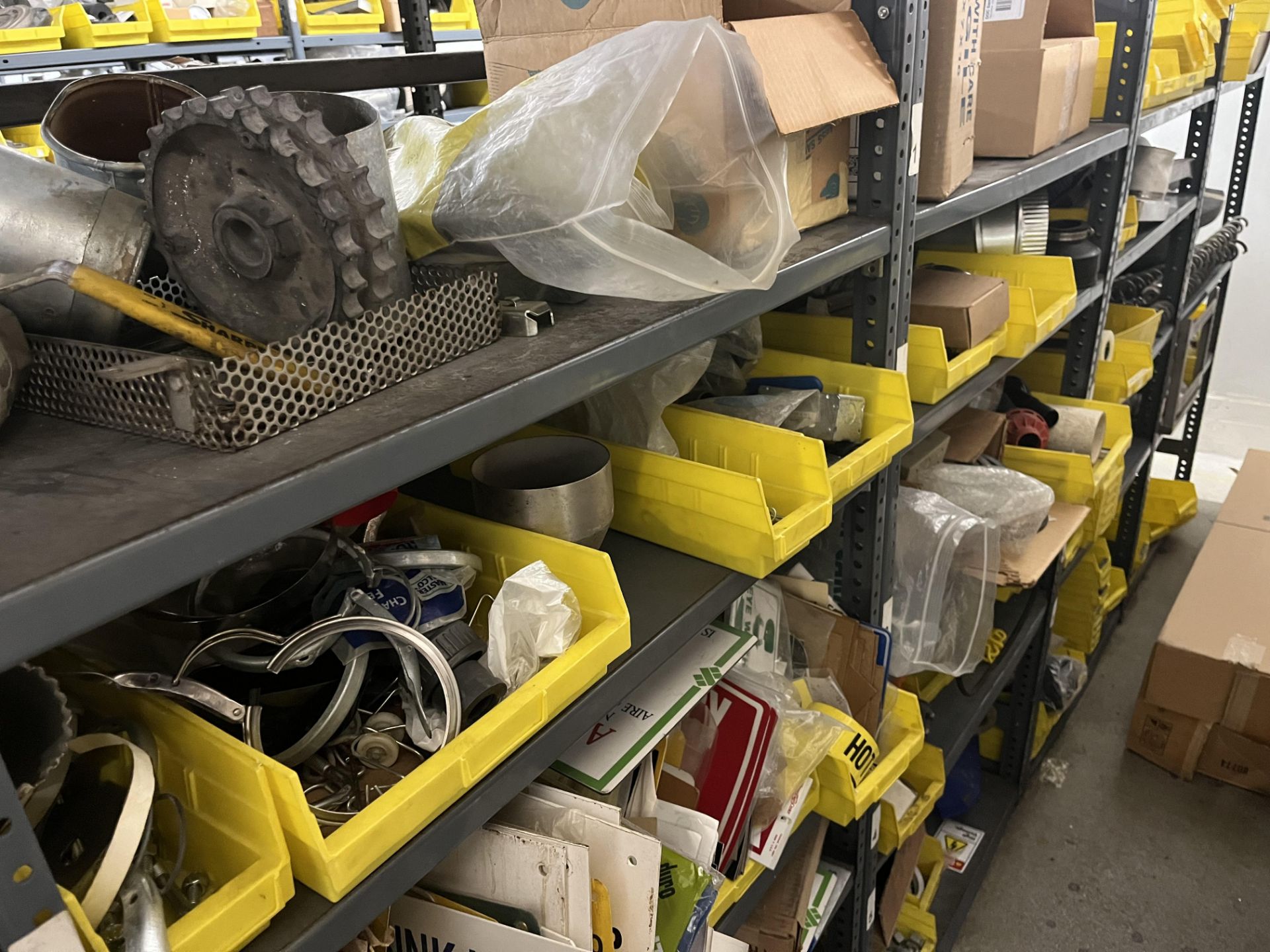 LOT OF shelf & contents: bushings, bell reducers, elbows, gears, signs, springs, Rigging Fee: $ 425 - Image 14 of 15