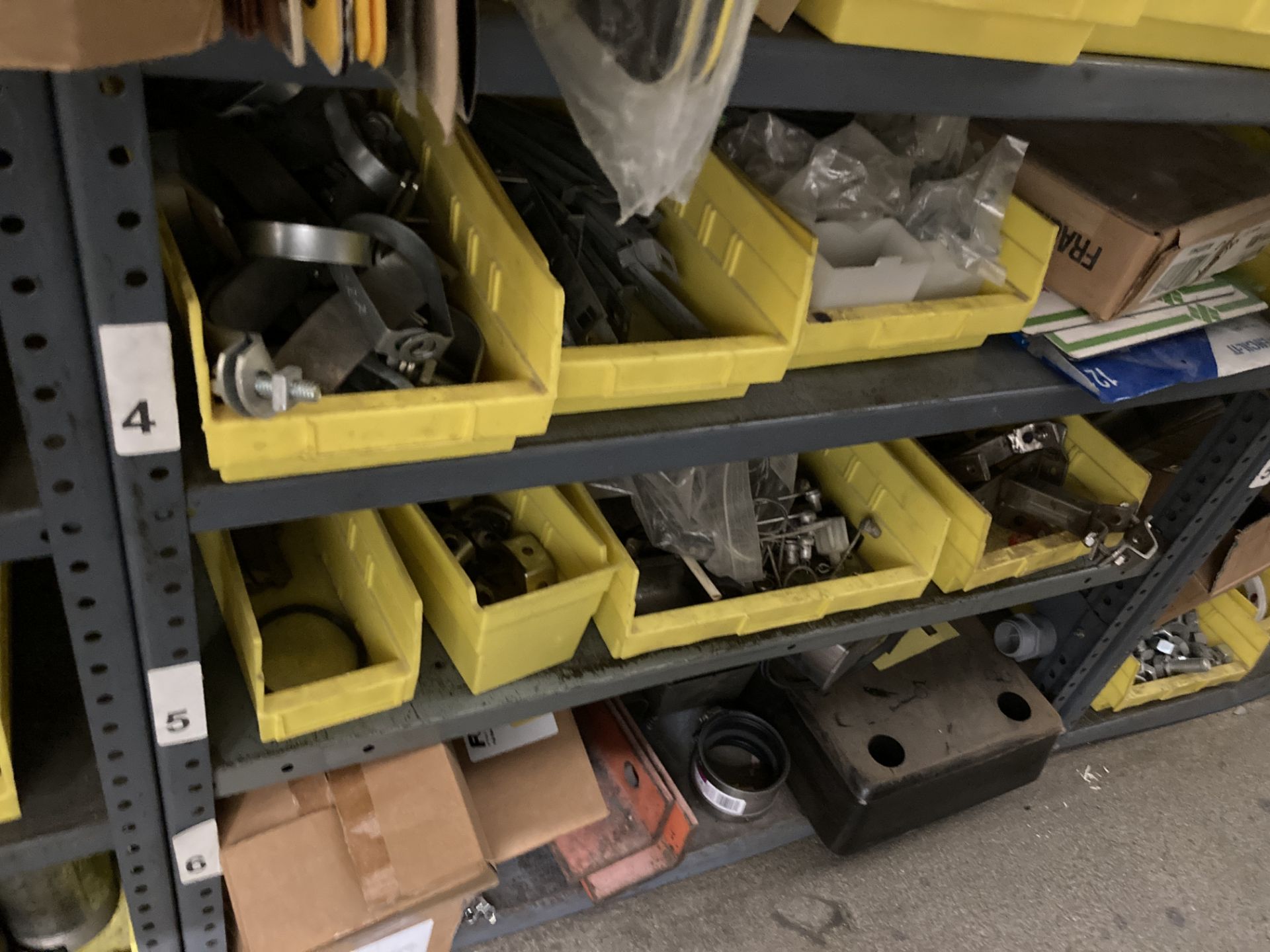 LOT OF shelf & contents: bushings, bell reducers, elbows, gears, signs, springs, Rigging Fee: $ 425 - Image 6 of 15