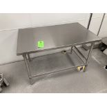 Stainless steel table, 30 in x 48 in Rigging Fee: $ 35