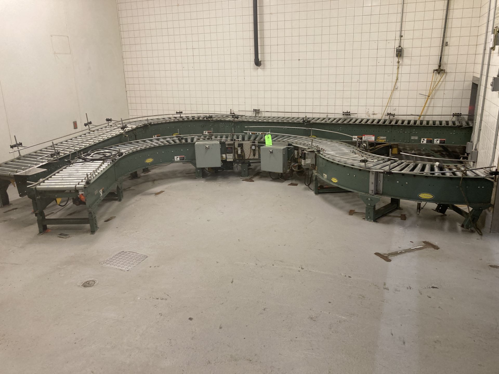 Hytrol case conveyor , 17 in BF width straight with offset and 90 deg turns Rigging Fee: $ 900