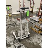 Hand operated lift truck with straddle legs Rigging Fee: $ 50
