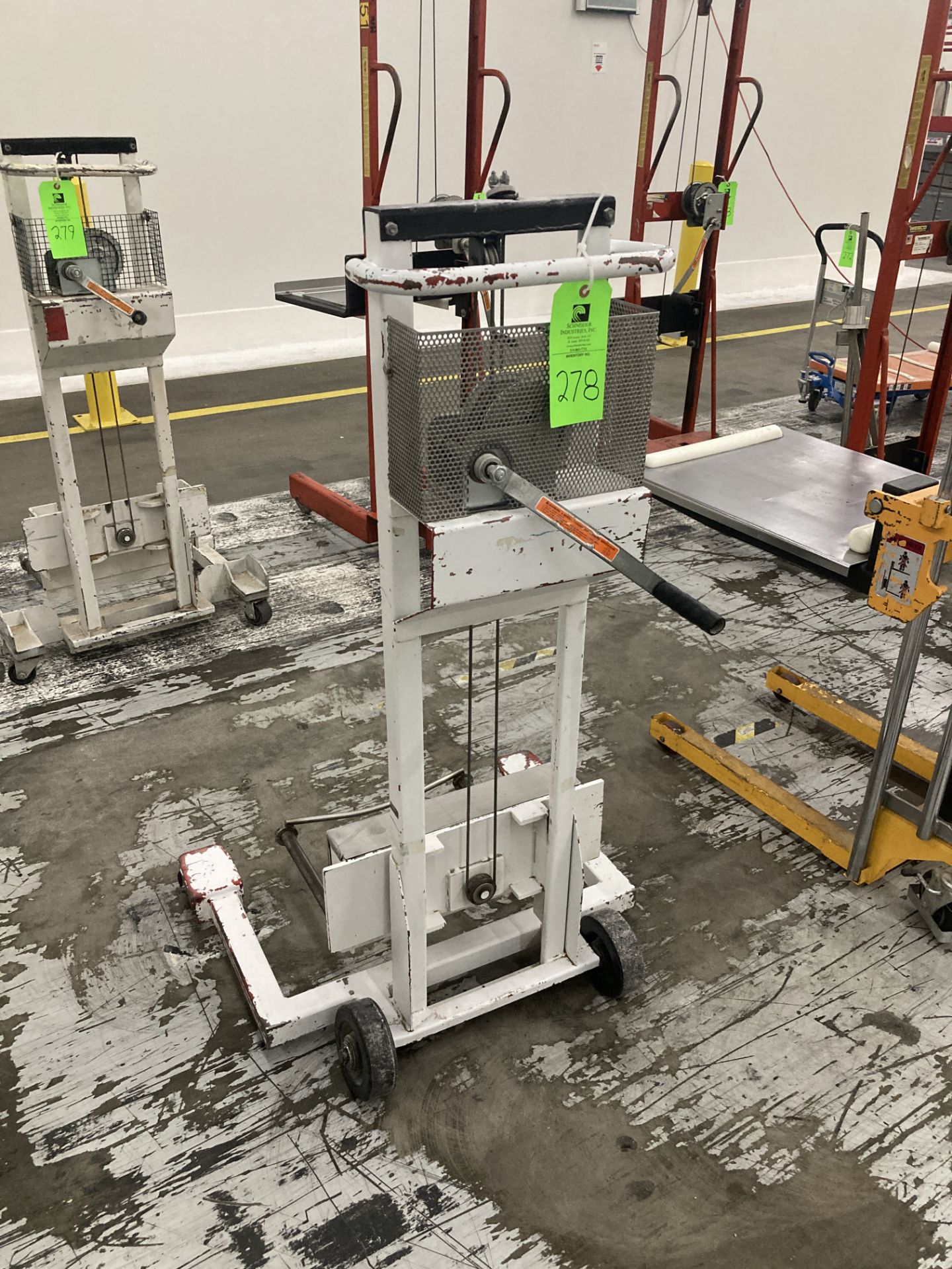 Hand operated lift truck with straddle legs Rigging Fee: $ 50