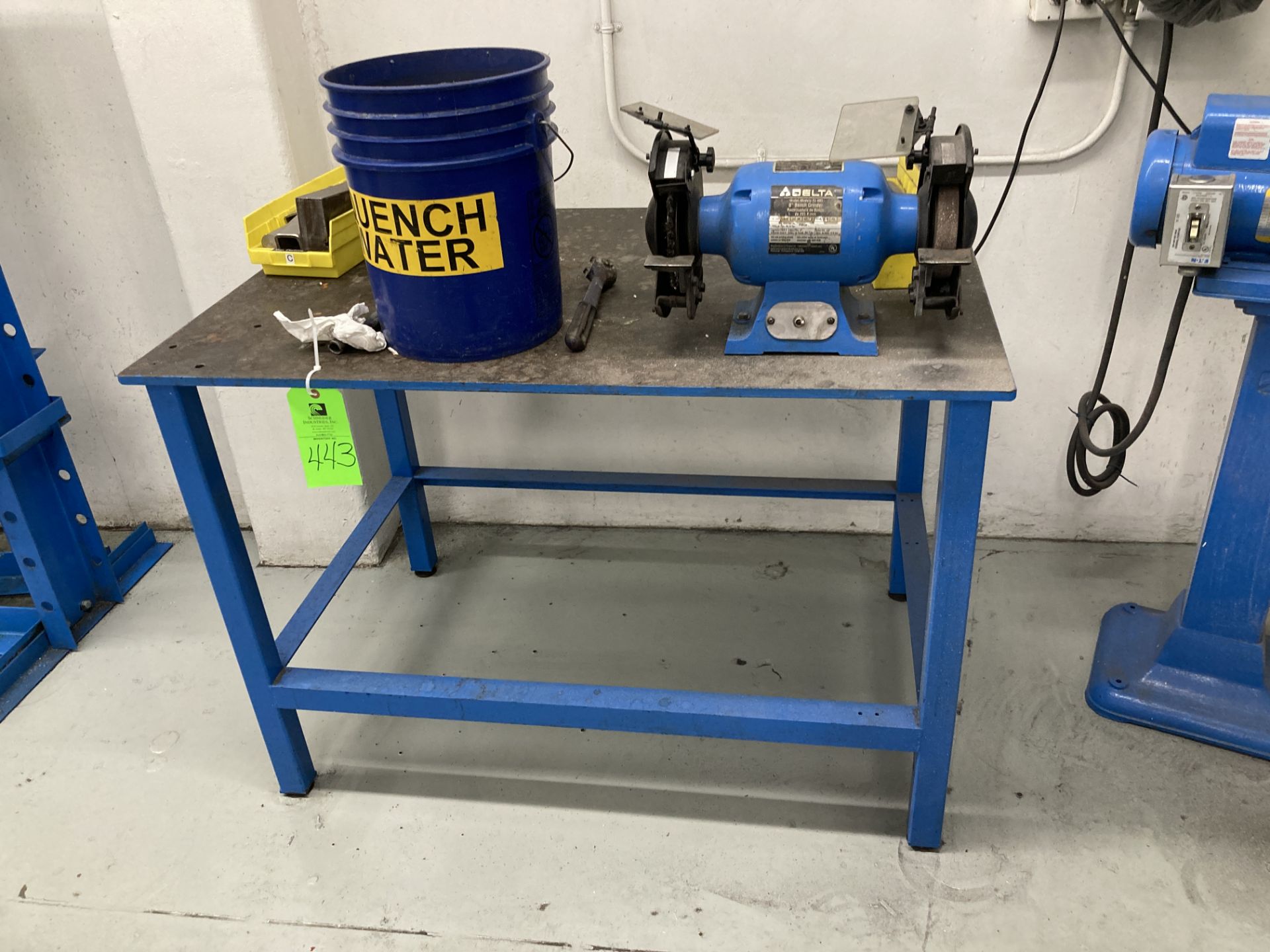 Steel table 48 in 31 in with Delta 8 in grinder, 1/2 hp, 115 vac Rigging Fee: $ 75