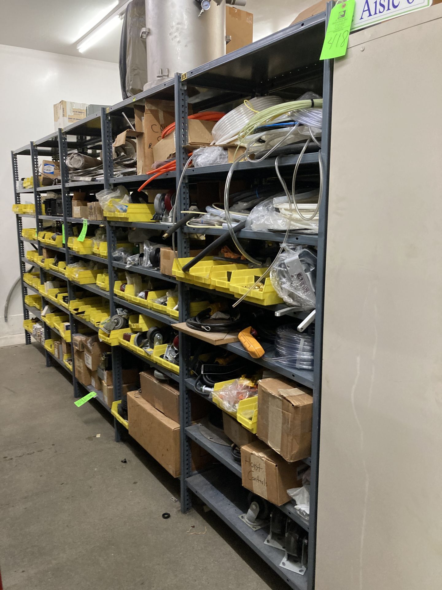 LOT OF shelf units and content on shelf, Aisle 6 &7 Rigging Fee: $ 200