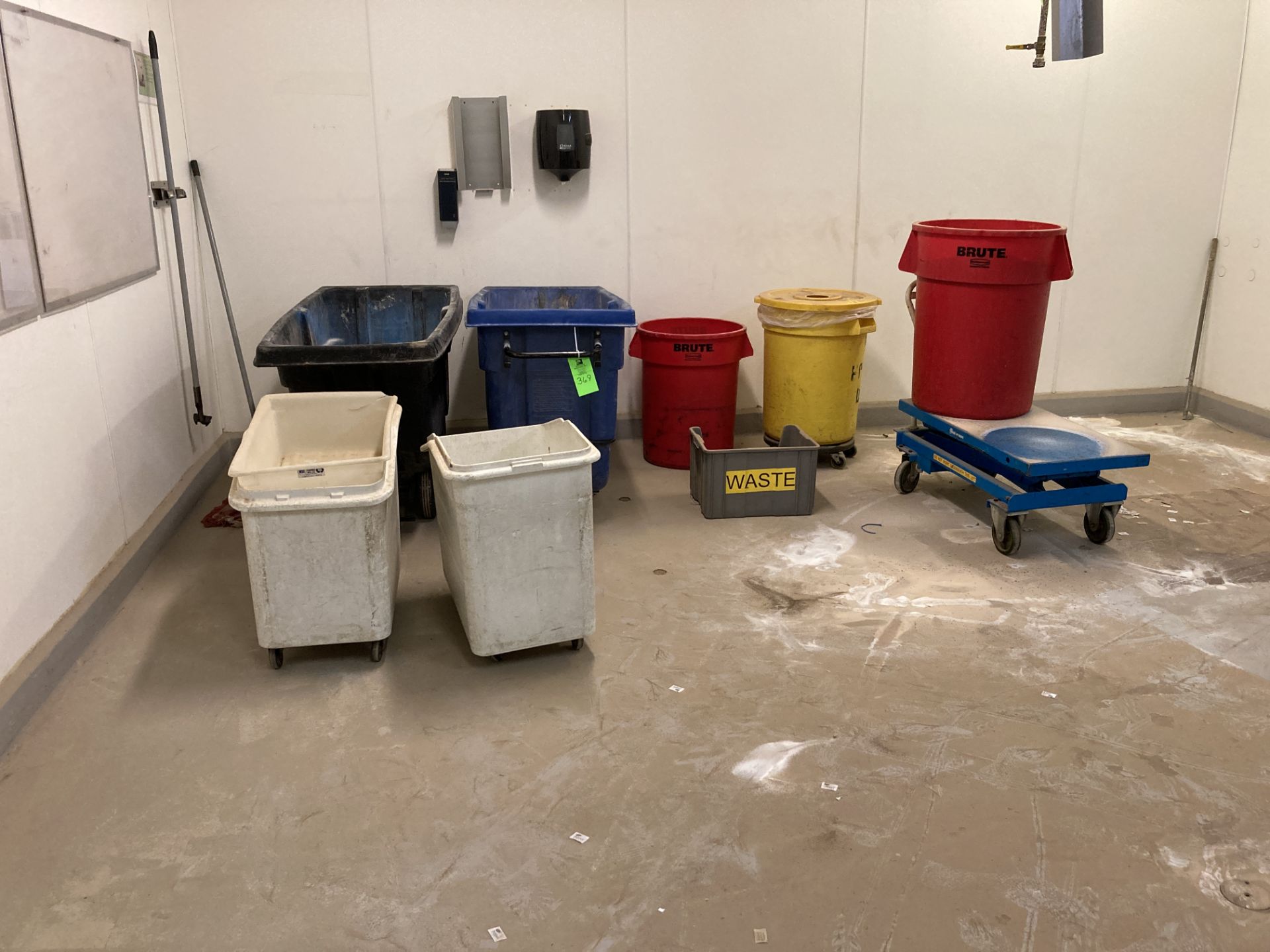 LOT OF 8 waste containers with Bishamon lift table 20 in x 40 , model BX30SE Rigging Fee: $ 125