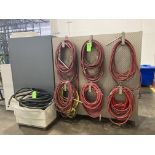 Lot of air hoses, water hoses with aluminum plating, and hanger. Rigging Fee: $ 100