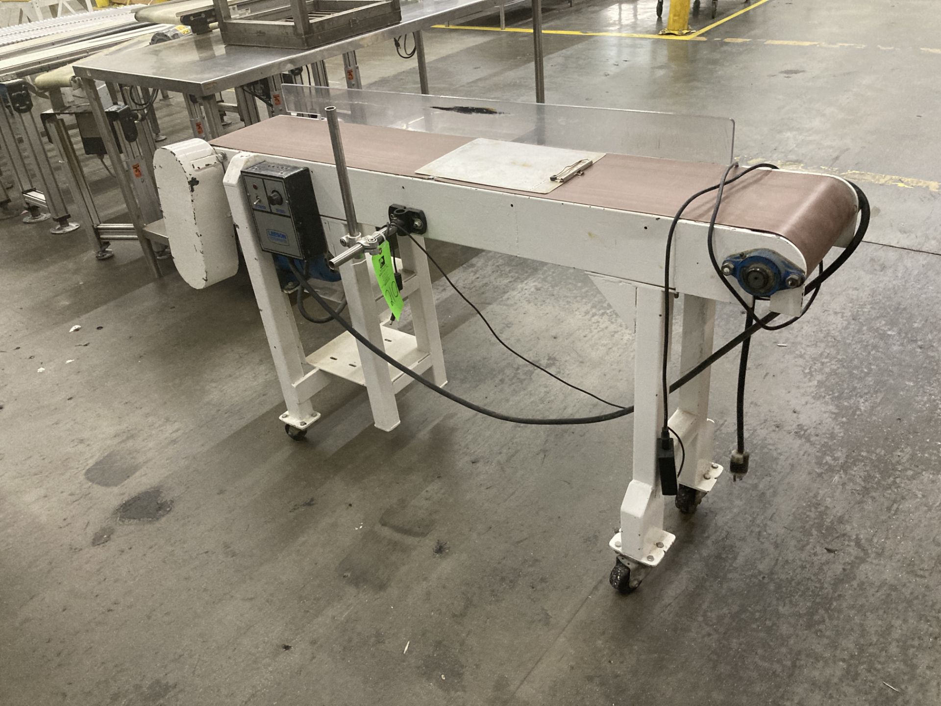 Leeson vfd control conveyor on caster, 10 in x 60 in Rigging Fee: $ 100
