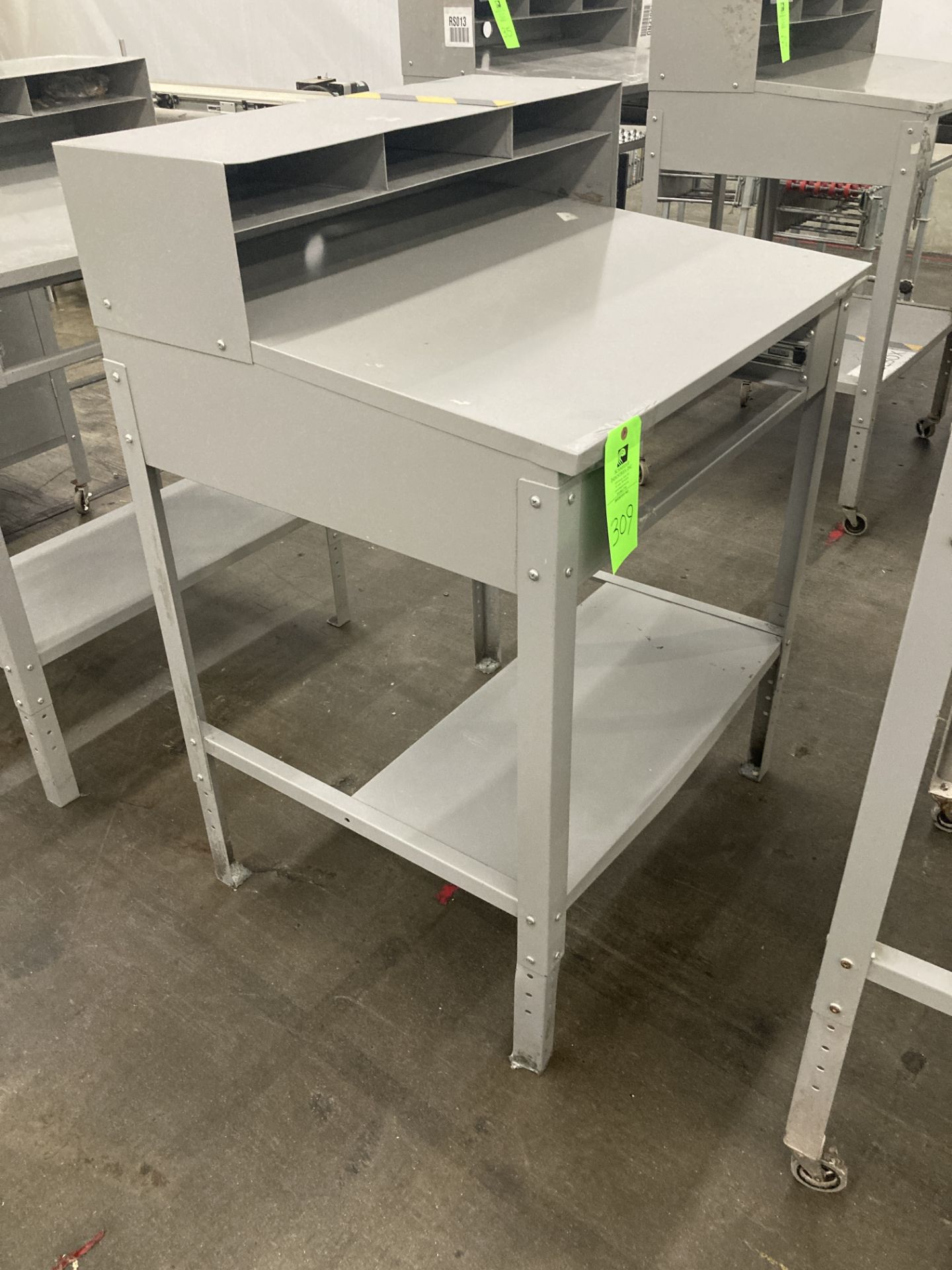 Qty. 6 Metal construction workstations. 35 in w x 30 in d Rigging Fee: $ 75