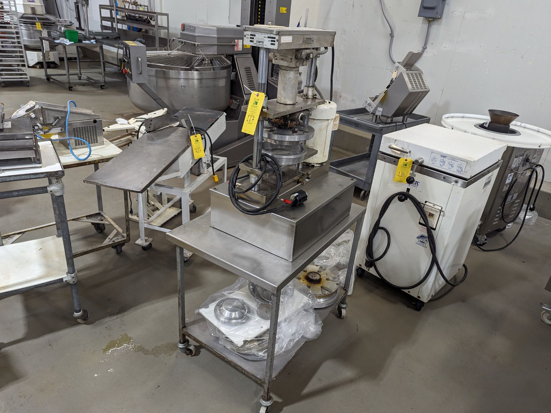 Comtec 2200 Pie Press on table with parts, Dimensions LxWxH: 36x27x37