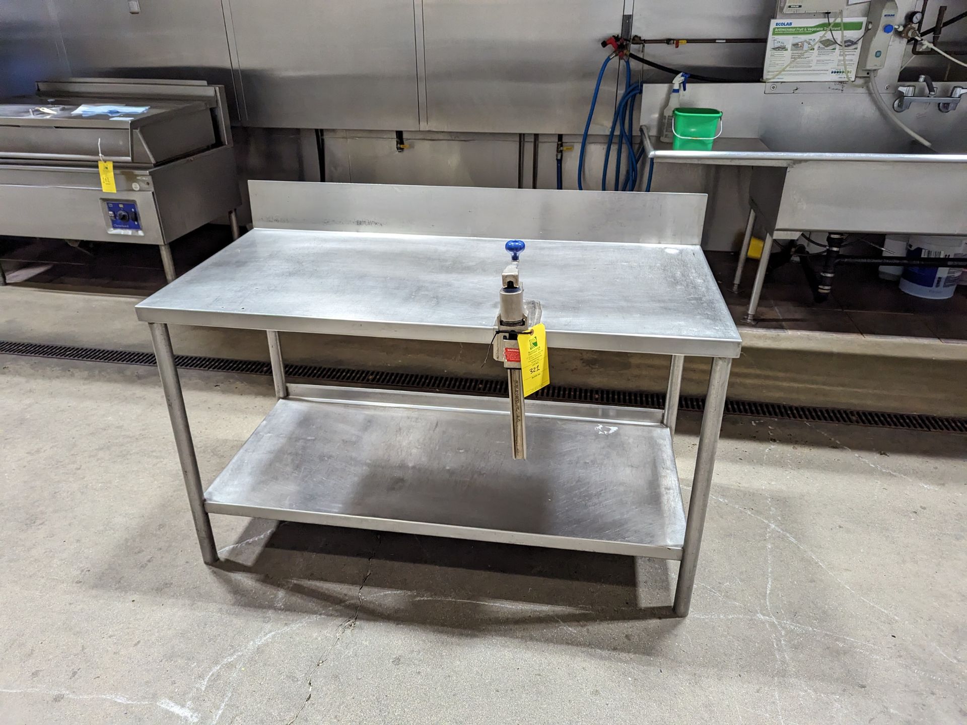 SS Table with Can Opener, 55in x 25in Surface with Backsplash 55x25x39