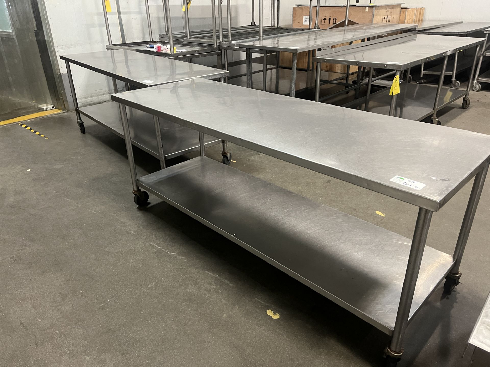 Lot of 2 7ft Long SS Tables Each, Dimensions LxWxH: 84x30x35