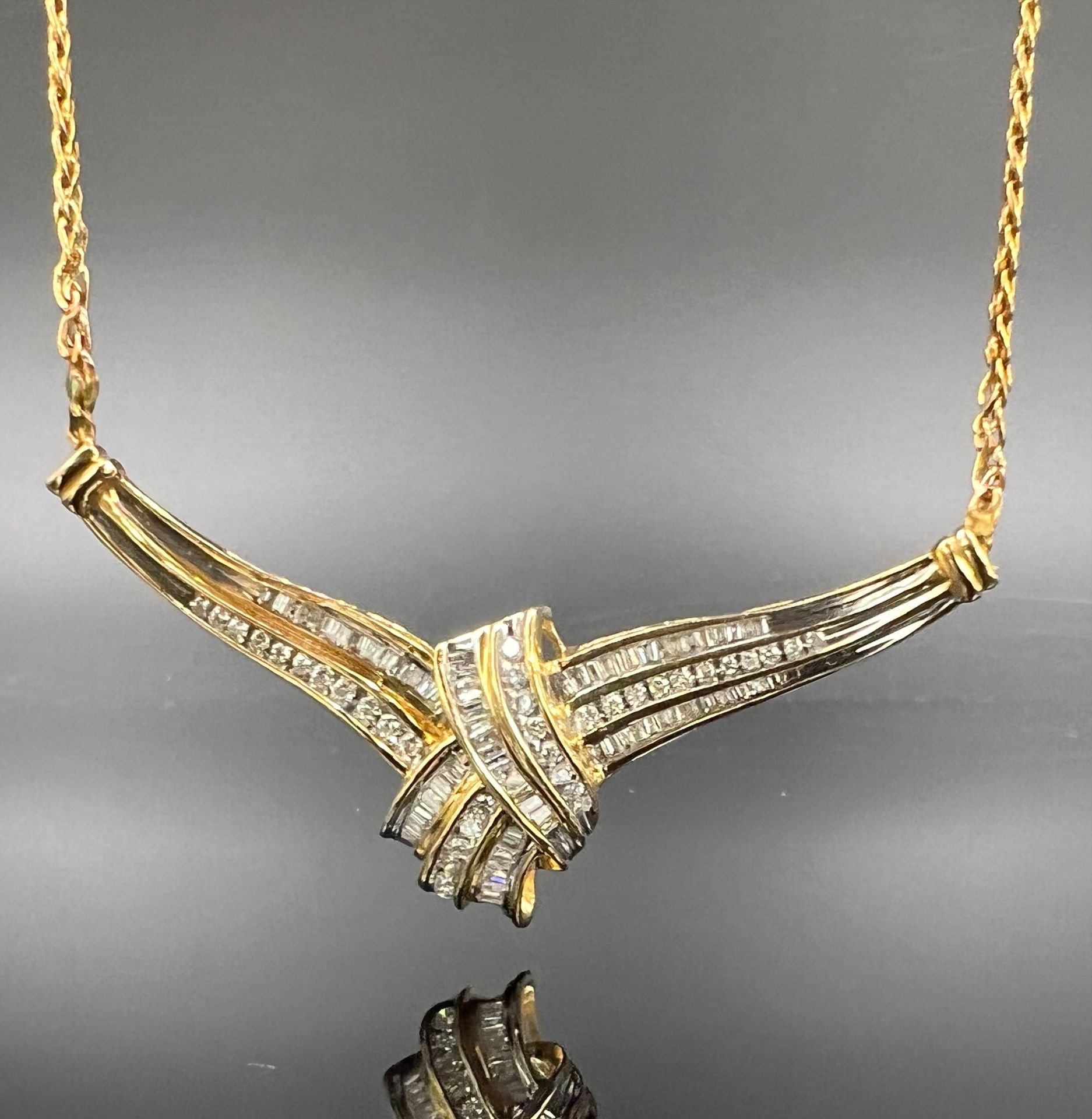 Necklace. 585 yellow gold and white gold with diamonds.