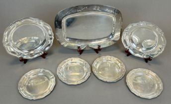 Set of 7 silver pieces. Plates and bowls. 800/835 silver.