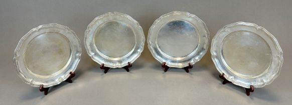 4 place plates. 800 silver. Germany. Around 1900.