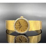 Baumen & Mercier ladies' wristwatch. 750 yellow gold with diamonds.