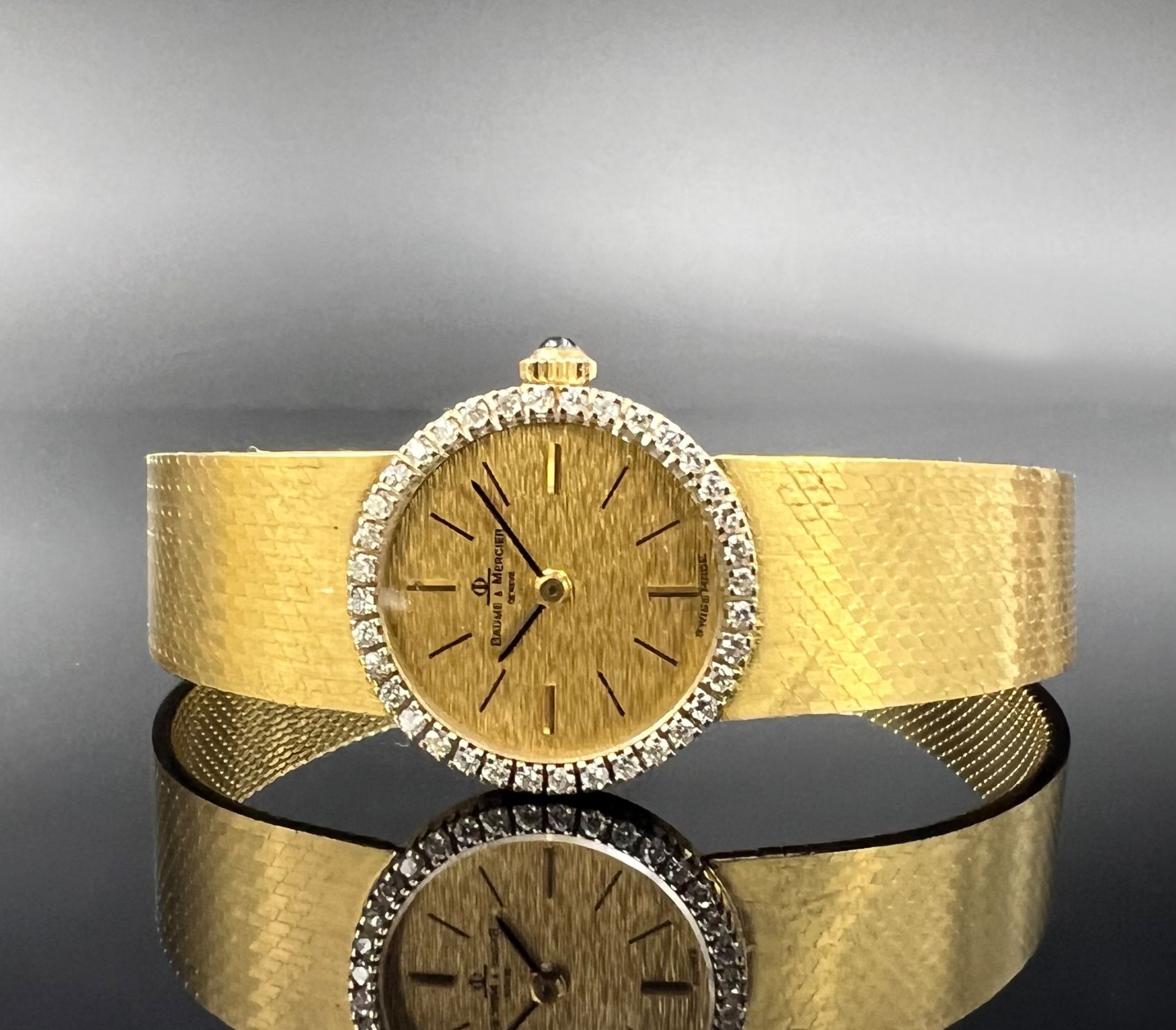Baumen & Mercier ladies' wristwatch. 750 yellow gold with diamonds.