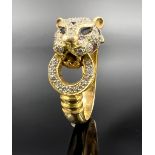 Ladies' ring "Cheetah". 750 yellow gold and white gold with gemstone setting.