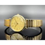 CELECTION wristwatch. Case 585 yellow gold. Quartz.