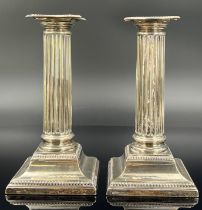 Pair of antique candlesticks in column form. Sterling silver. England. Circa 1870.