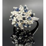 Ladies' ring. 585 white gold with diamonds and sapphires.