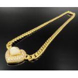 Collier. 750 Gelbgold mit sehr kleinen Diamanten und wohl satiniertem Perlmutt.