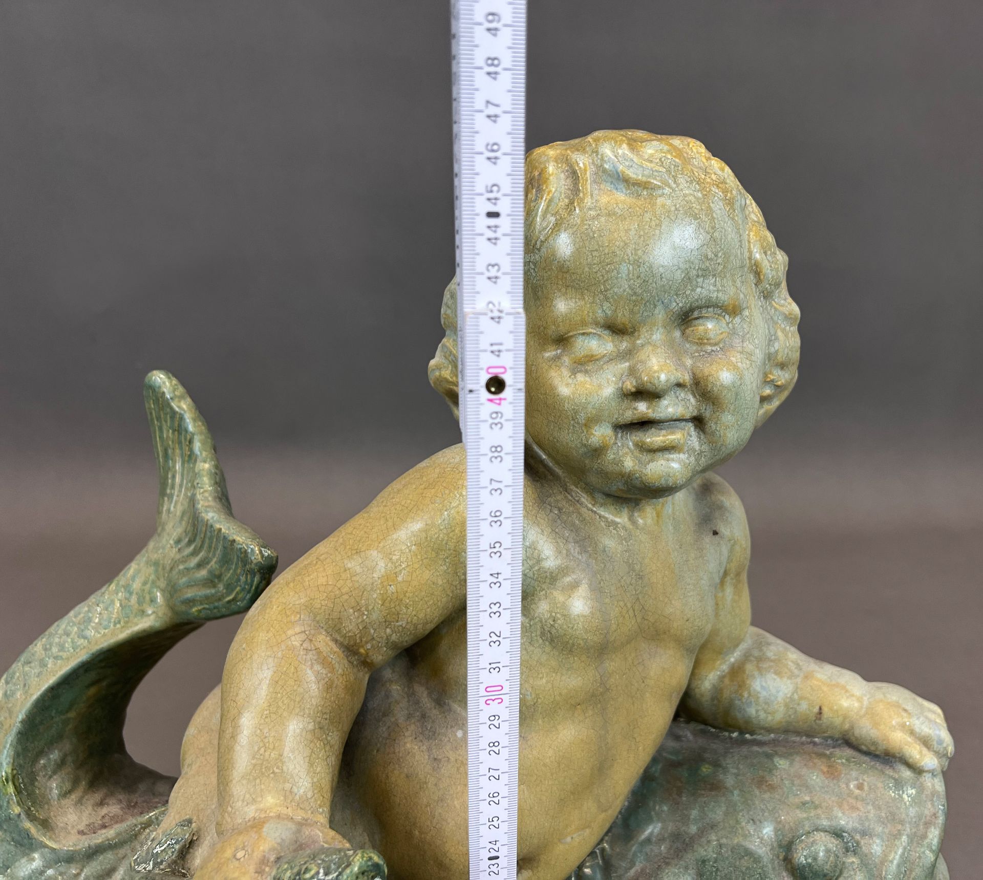 Majolika-Figur. Putto auf Fisch. Anfang 20. Jahrhundert. - Bild 13 aus 13